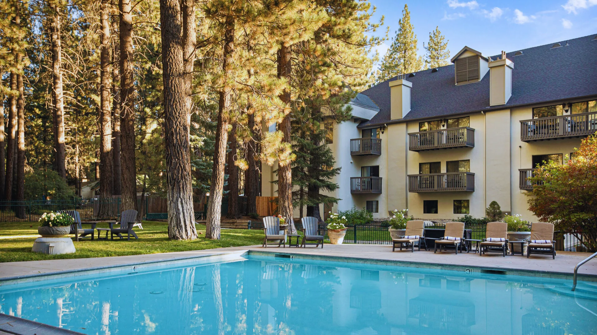 outdoor heated pool and lounge chairs